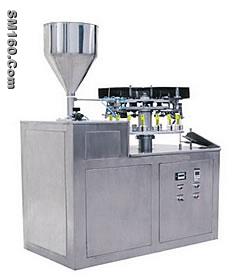 Metallic tube filling & sealing machine