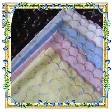 All over eyelet embroidery fabric