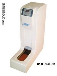 Automatic shoe cover dispenser