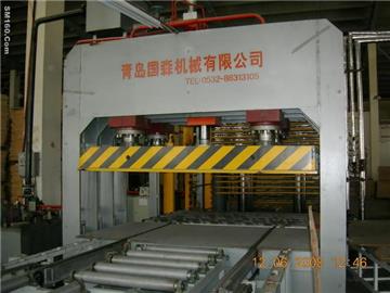 Laminated flooring production machine