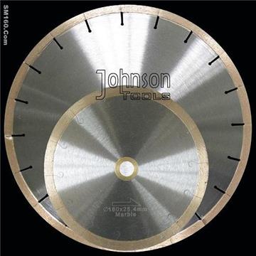 Sintered saw blade with laser cut J slot